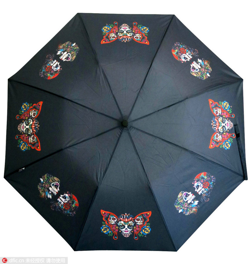 Artistic designs on umbrellas brighten up rainy days