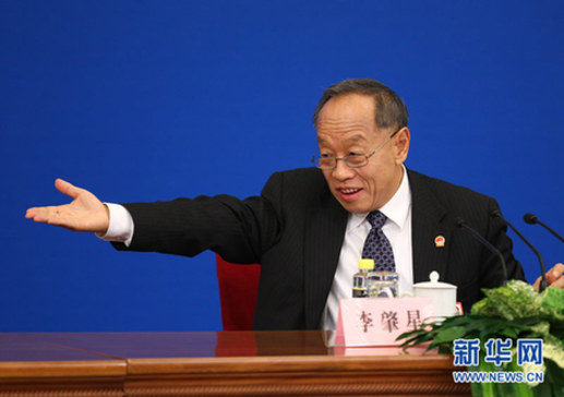 李肇星：中國(guó)各方面總體上已實(shí)現(xiàn)有法可依