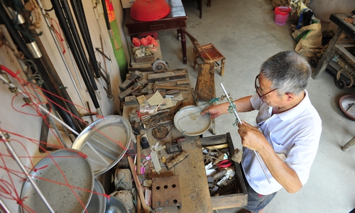 蘆洪市鎮(zhèn)老街的手藝人