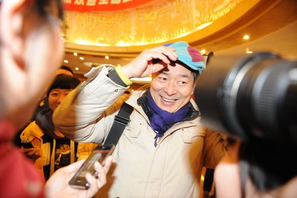 iPhone受寵！看看兩會記者的采訪工具