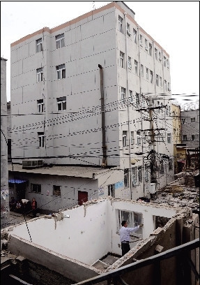 北京拆除蟻族聚居地唐家?guī)X村違章建筑(圖)