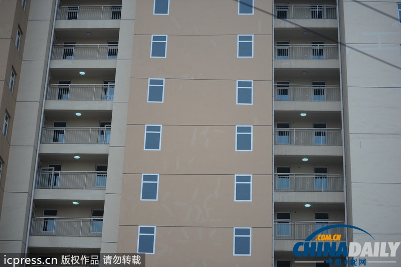 青島一經(jīng)適房小區(qū)墻體上畫(huà)假窗 遭網(wǎng)友調(diào)侃“神筆馬良”