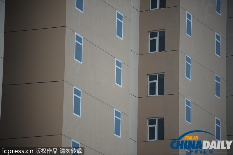青島一經(jīng)適房小區(qū)墻體上畫假窗 遭網(wǎng)友調(diào)侃“神筆馬良”