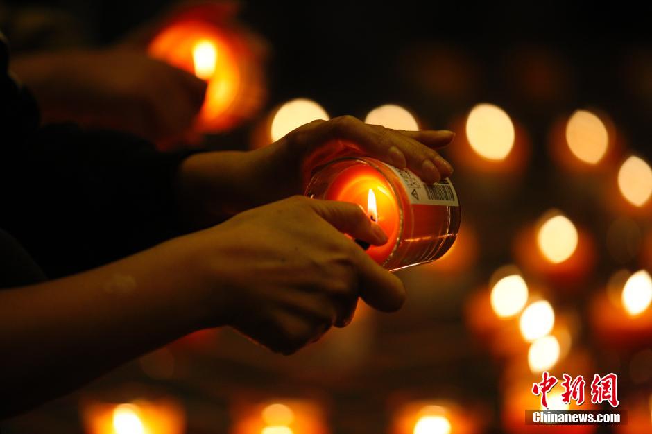 MH370航班失聯滿月 在京乘客家屬舉行祈福活動
