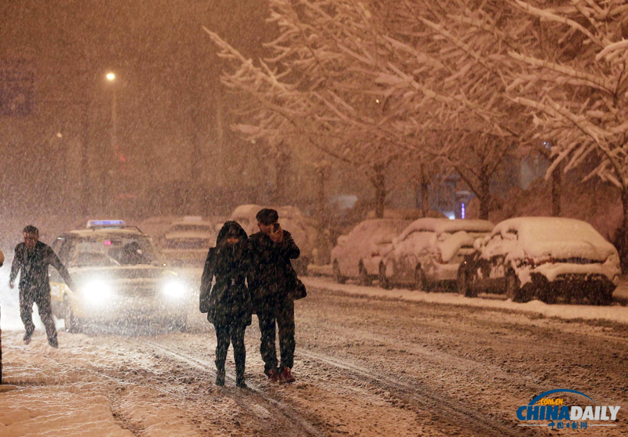 中國(guó)日?qǐng)?bào)直擊北京三月春雪