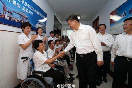 習近平：全面建成小康社會，殘疾人一個也不能少