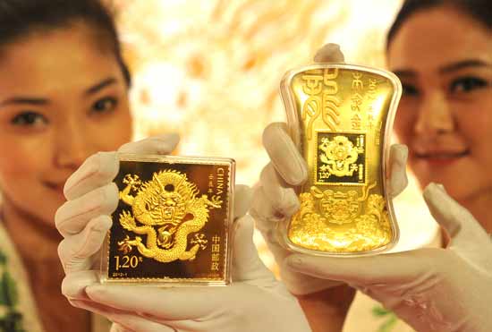 中國集郵總公司推出龍年郵票金磚 集藏界掀起“郵金熱潮”