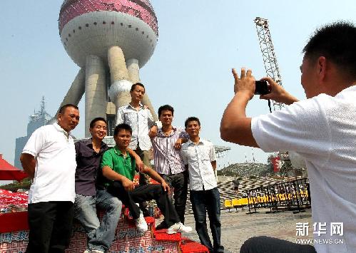 扮靚城市高空的“蜘蛛人”