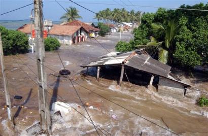 Asian Tsunami kills 14,425, many more homeless