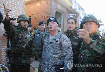 李明博提名金寬鎮擔任新防長 朝譴責美韓把半島推向“戰爭邊緣”