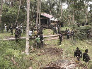 菲武裝分子血洗村莊11人亡 遭綁仨月兩中國公民獲救