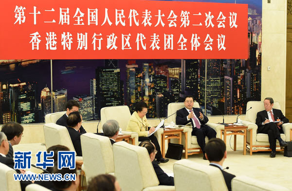 張德江分別參加香港代表團、澳門代表團審議