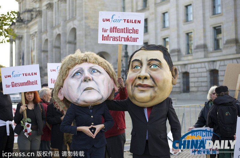 德民眾棄默克爾與社民黨主席“頭顱” 抗議兩黨聯合執政
