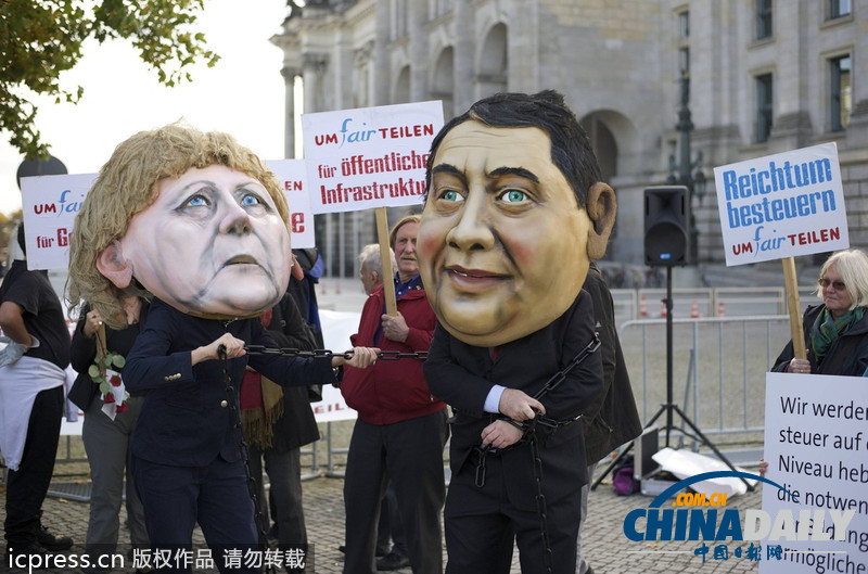 德民眾棄默克爾與社民黨主席“頭顱” 抗議兩黨聯合執政
