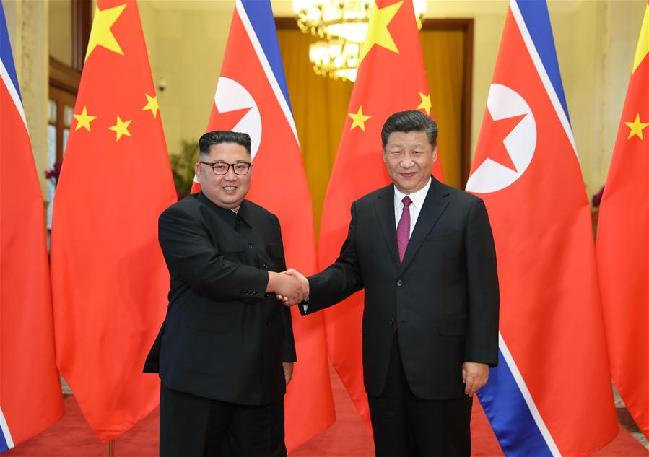 習(xí)近平同金正恩舉行會(huì)談