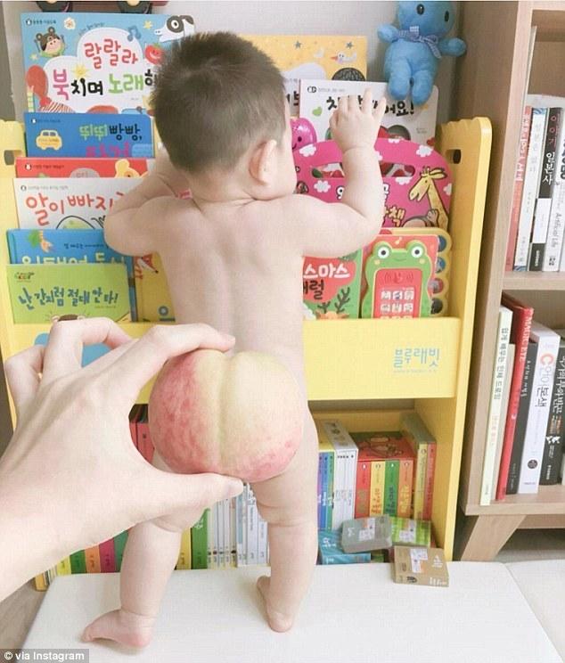 日本媽咪曬萌寶照片走紅網絡 蜜桃臀萌哭網友（組圖）